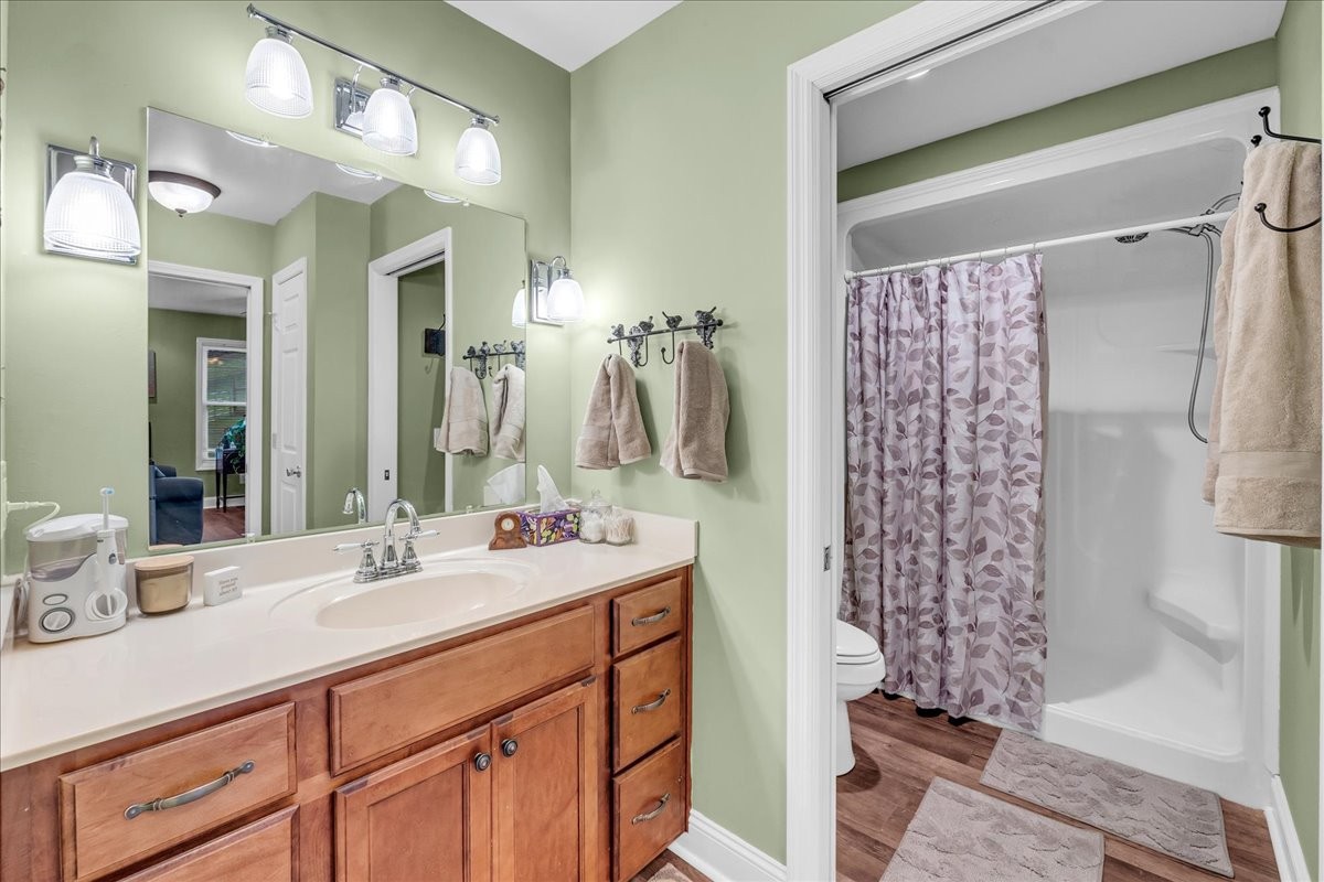 830 Bobo Hollow Road Lynchburg, TN 37352 - Photo 47 of 71 a bathroom with a double vanity sink mirror and shower