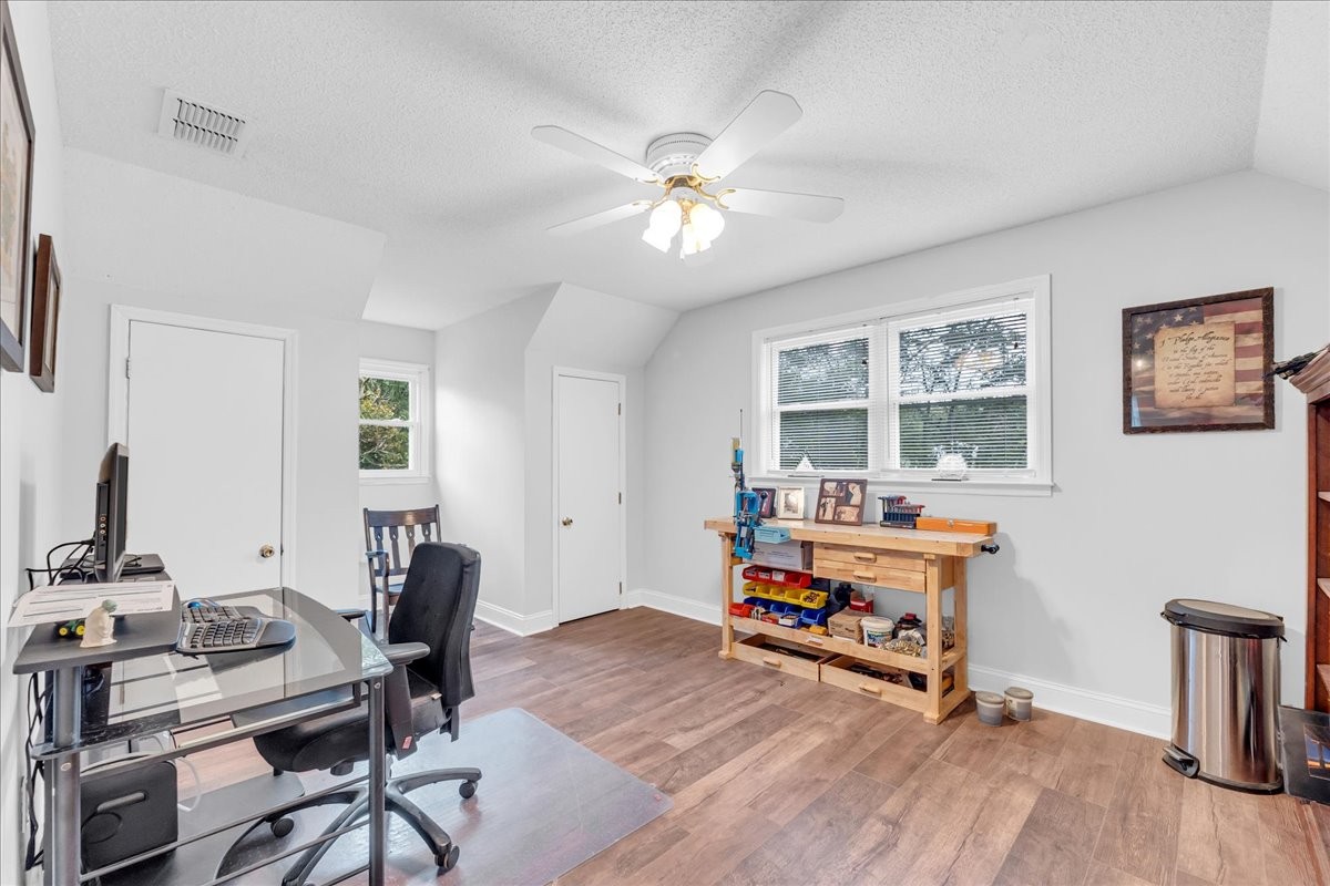 830 Bobo Hollow Road Lynchburg, TN 37352 - Photo 52 of 71 a view of a workspace with furniture and a window