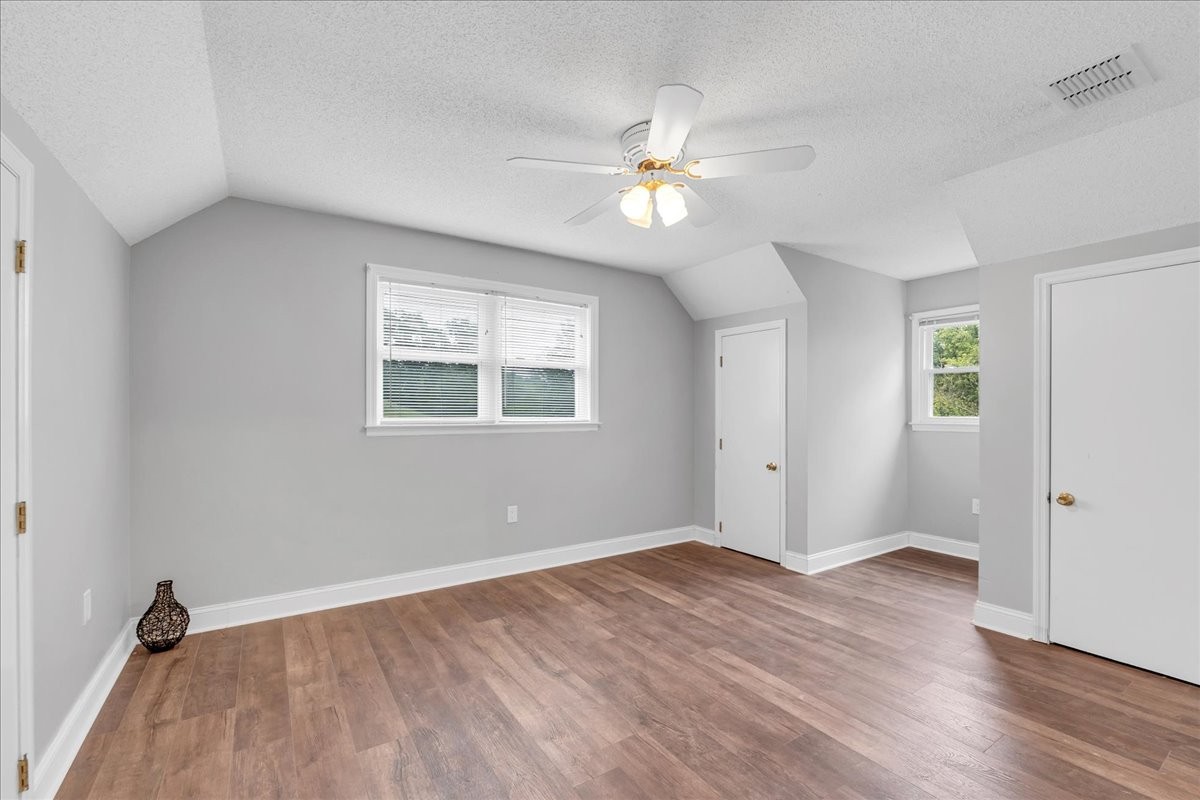 830 Bobo Hollow Road Lynchburg, TN 37352 - Photo 56 of 71 a view of an empty room with wooden floor and a window