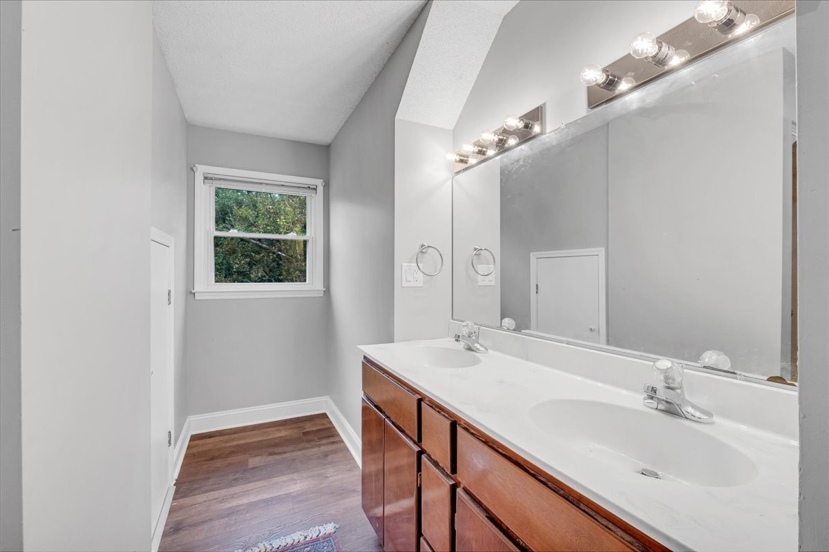 830 Bobo Hollow Road Lynchburg, TN 37352 - Photo 59 of 71 a bathroom with a sink double vanity and a mirror
