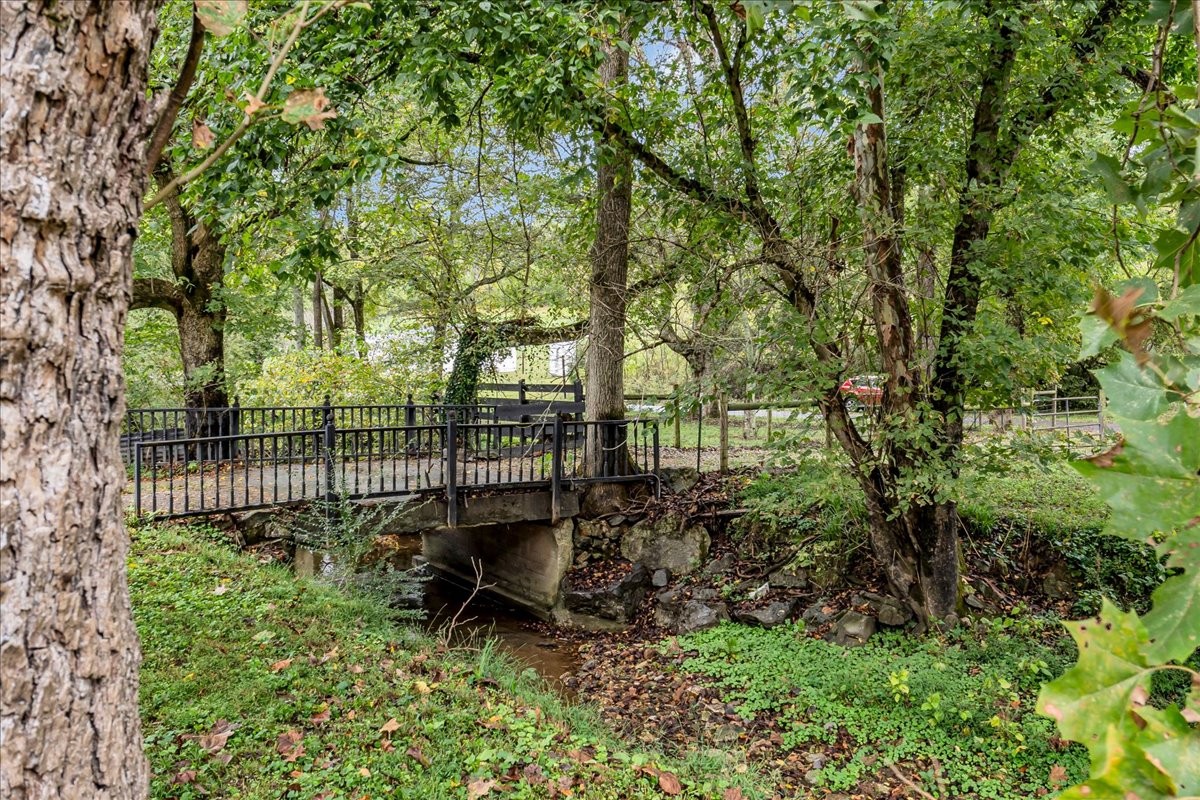 830 Bobo Hollow Road Lynchburg, TN 37352 - Photo 9 of 71 a garden view with a seating space