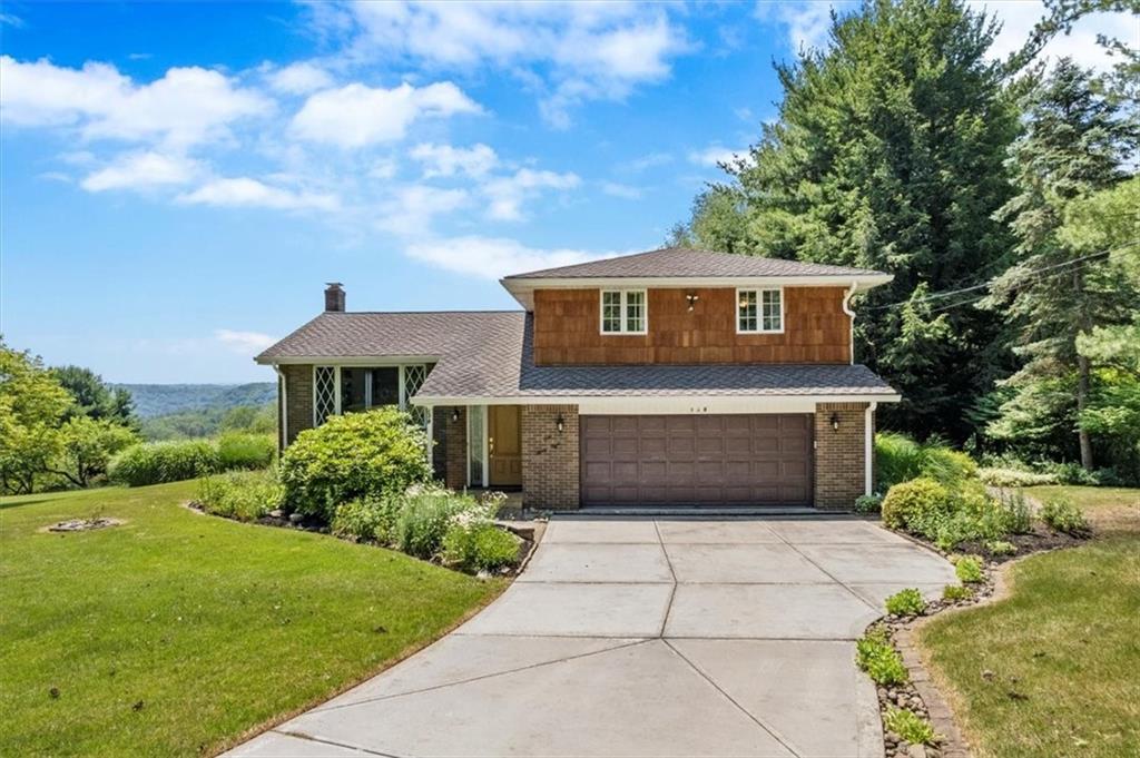 138 Stepp Road Sarver, PA 16055 - Photo 1 of 46 a front view of a house with a yard and trees