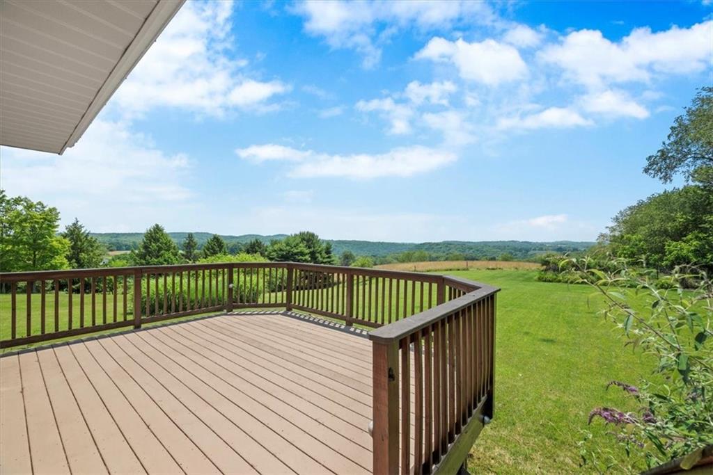 138 Stepp Road Sarver, PA 16055 - Photo 20 of 46 a balcony with wooden floor and lake view