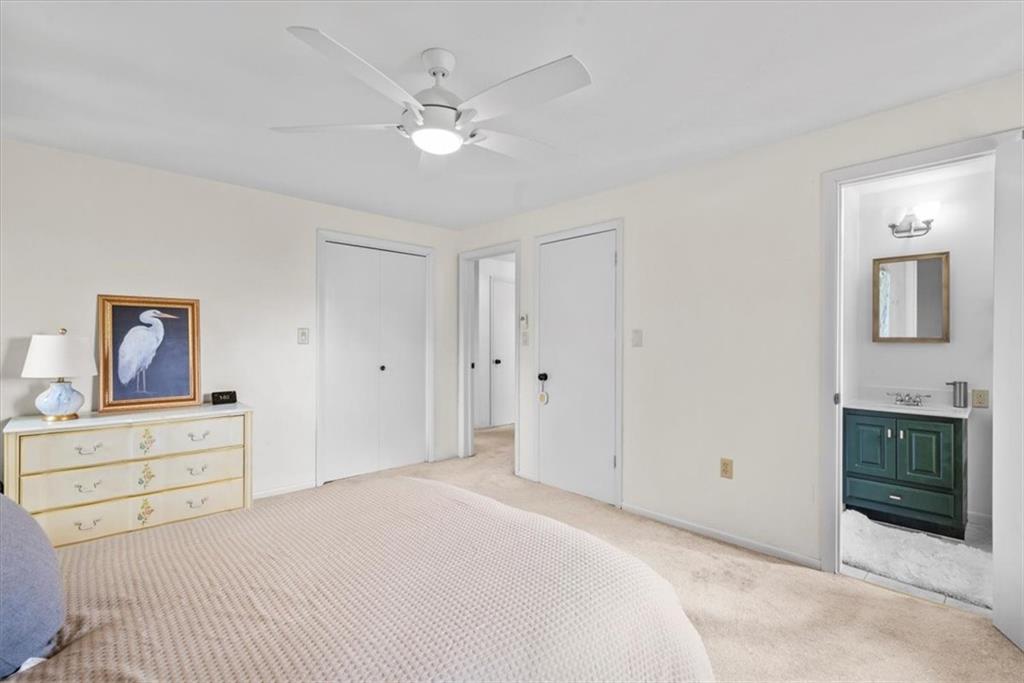 138 Stepp Road Sarver, PA 16055 - Photo 25 of 46 a bedroom with a bed and a chandelier