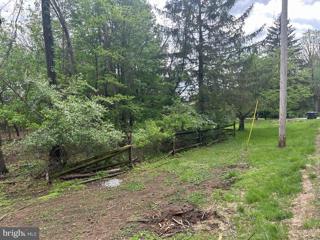 220 Fairview Road Glenmoore, PA 19343 - Photo 14 of 14 a view of outdoor space with a garden and trees