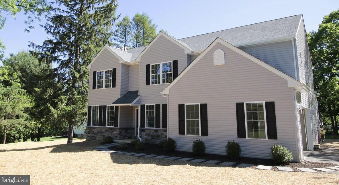 220 Fairview Road Glenmoore, PA 19343 - Photo 3 of 14 a front view of a house with a yard