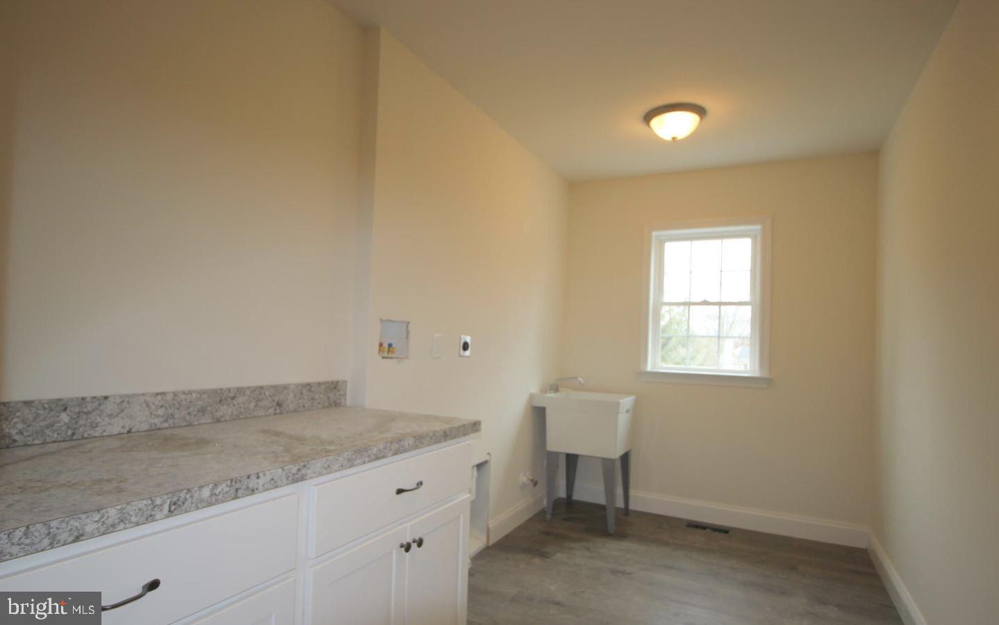 220 Fairview Road Glenmoore, PA 19343 - Photo 10 of 14 an empty room with windows