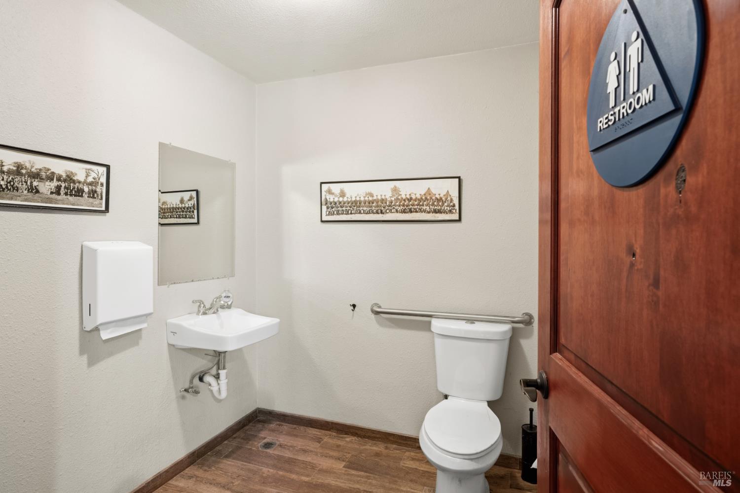 1435 Big Valley Road Lakeport, CA 95453 - Photo 14 of 21 a bathroom with a toilet a sink and a mirror