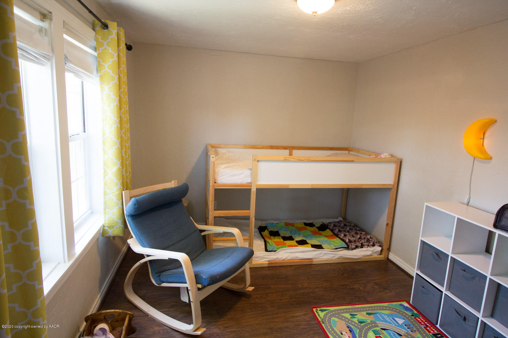 313 Southwest 38th Avenue Amarillo, TX 79110 - Photo 18 of 22 a room with a chair and a window