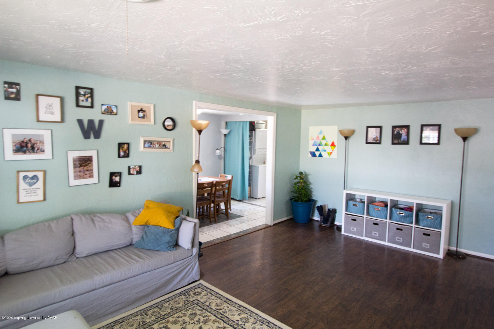 313 Southwest 38th Avenue Amarillo, TX 79110 - Photo 8 of 22 a living room with furniture and wooden floor