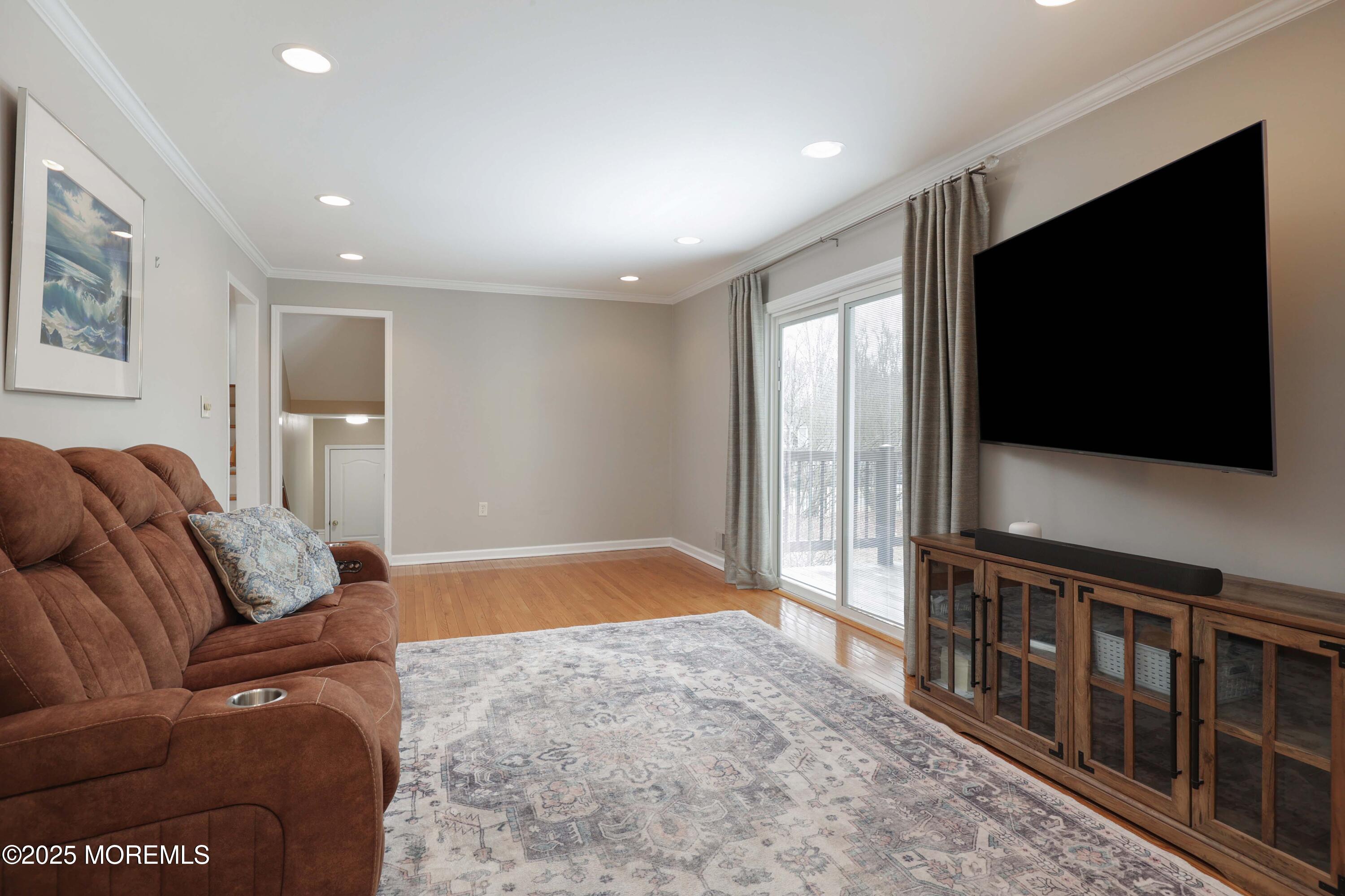 6 Hawthorne Road Red Bank, NJ 07701 - Photo 16 of 40 a living room with furniture and a flat screen tv