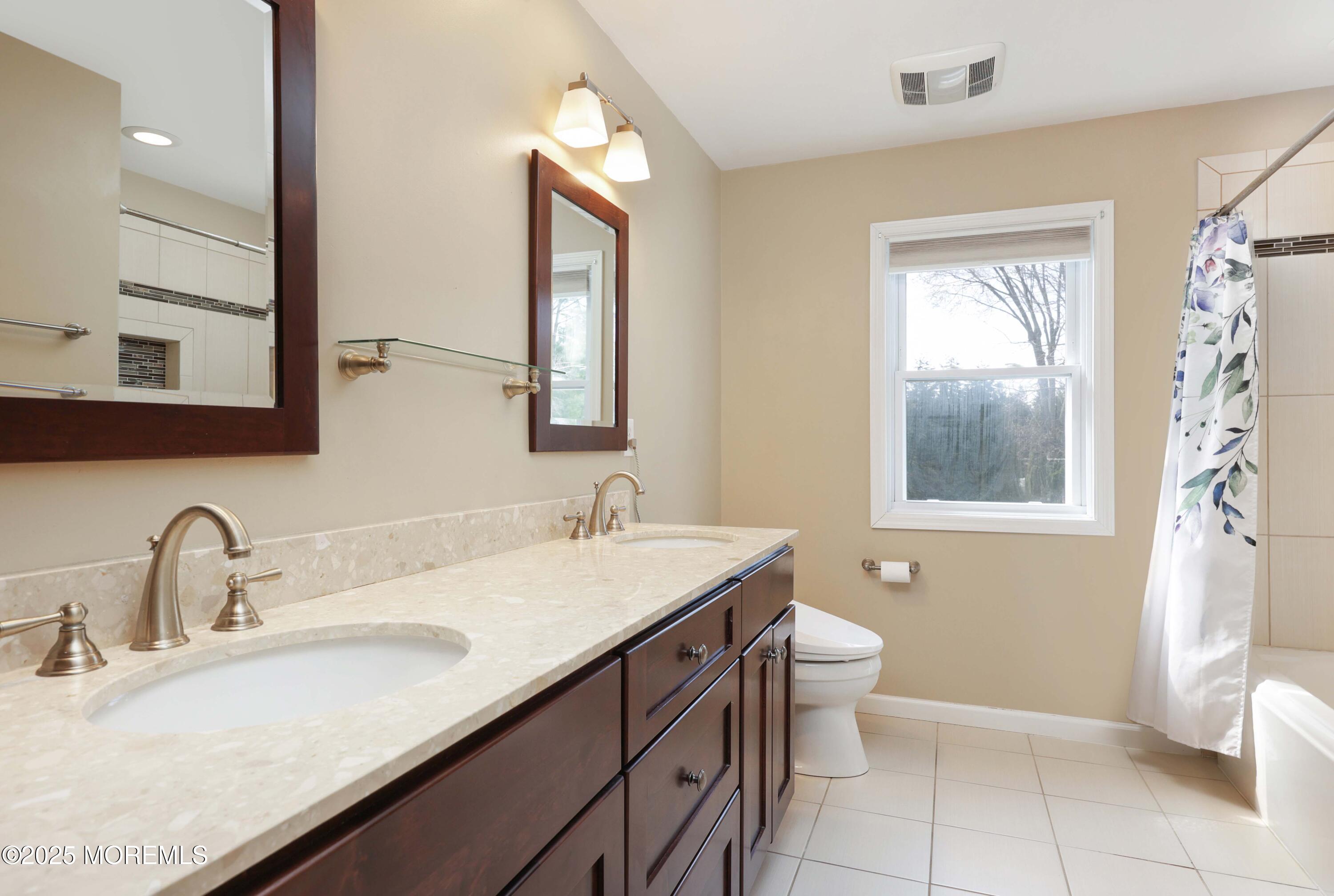 6 Hawthorne Road Red Bank, NJ 07701 - Photo 23 of 40 a bathroom with a sink and a mirror