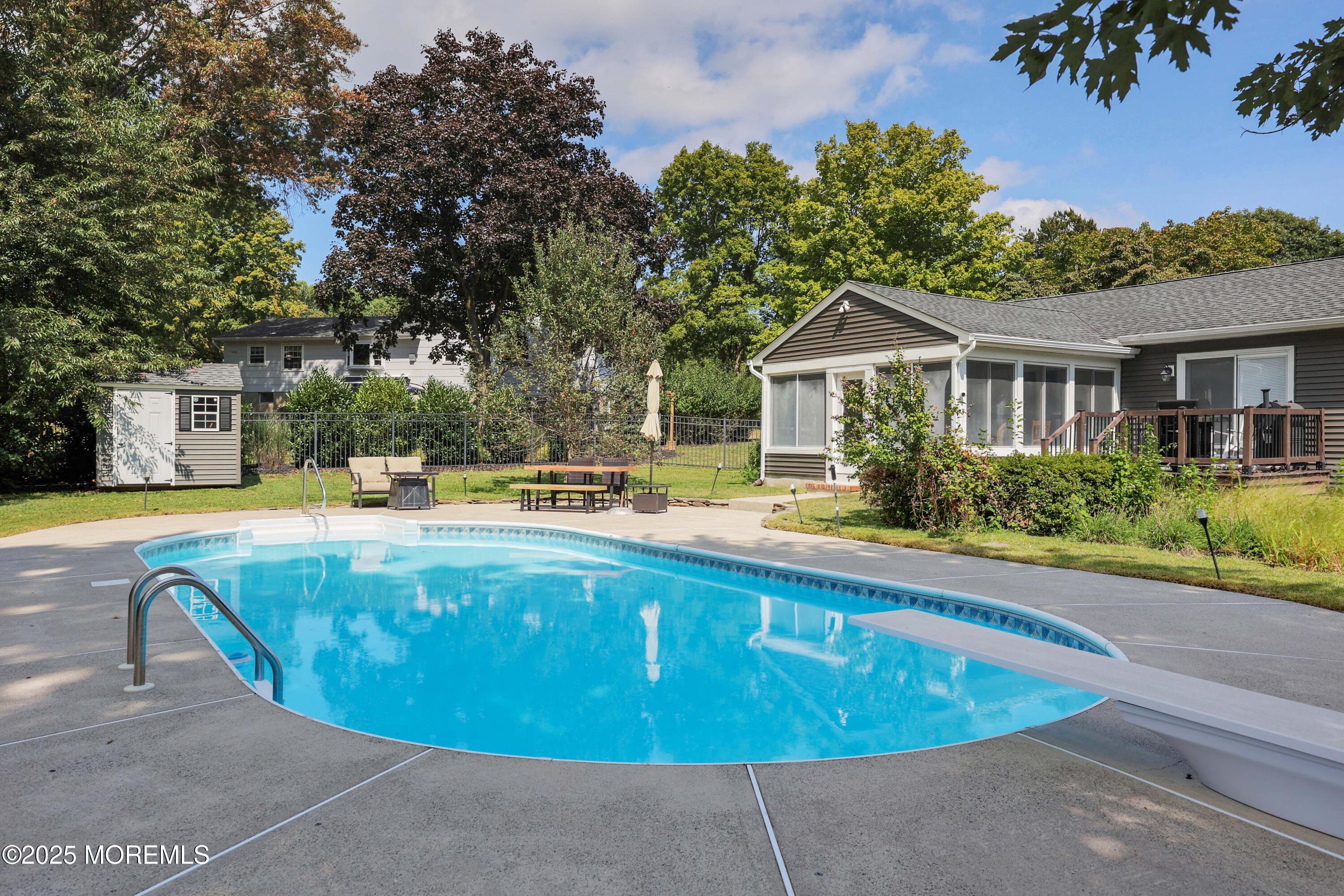 6 Hawthorne Road Red Bank, NJ 07701 - Photo 33 of 40 a view of a house with a swimming pool