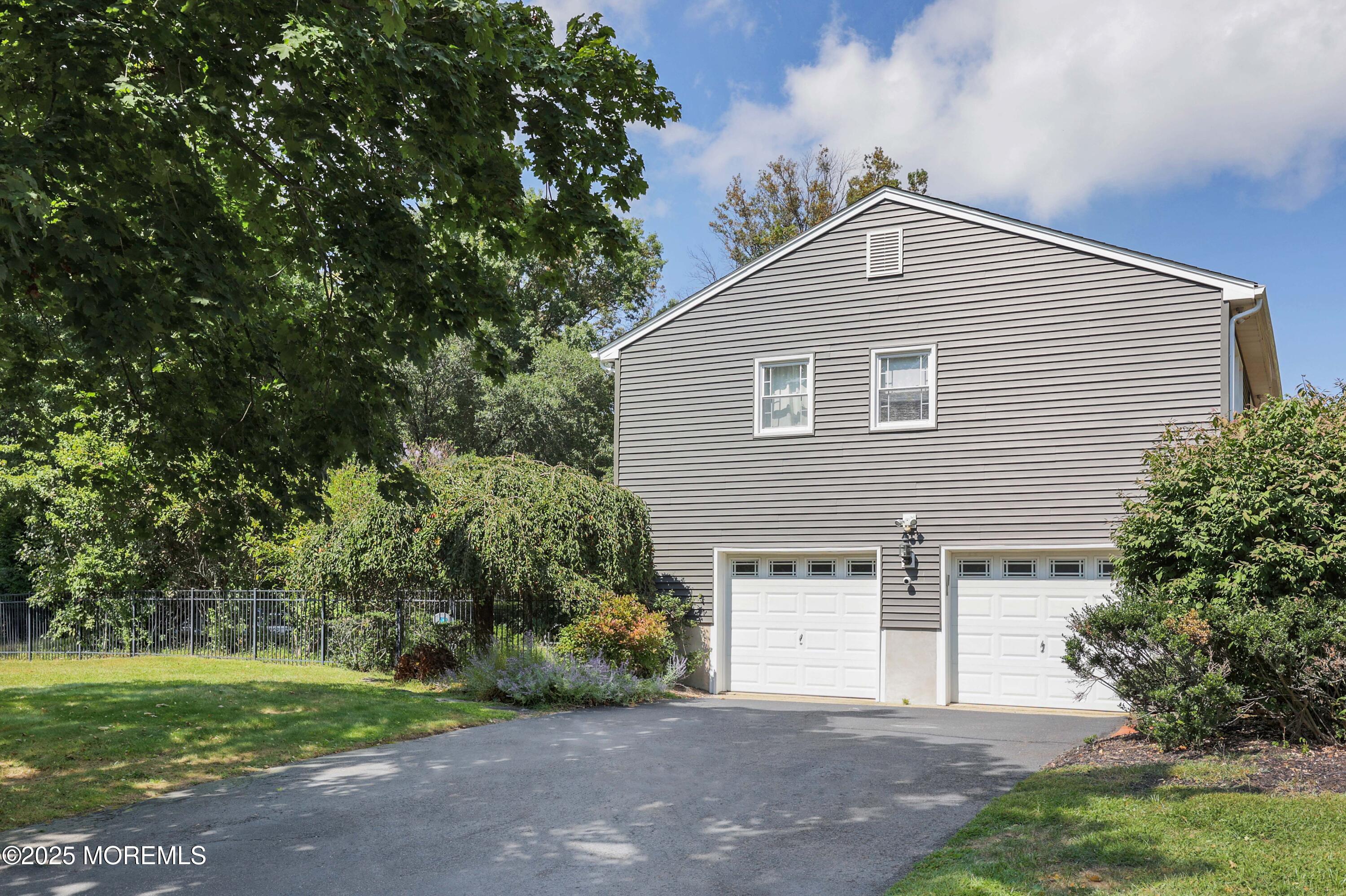 6 Hawthorne Road Red Bank, NJ 07701 - Photo 38 of 40 a front view of house with yard and green space