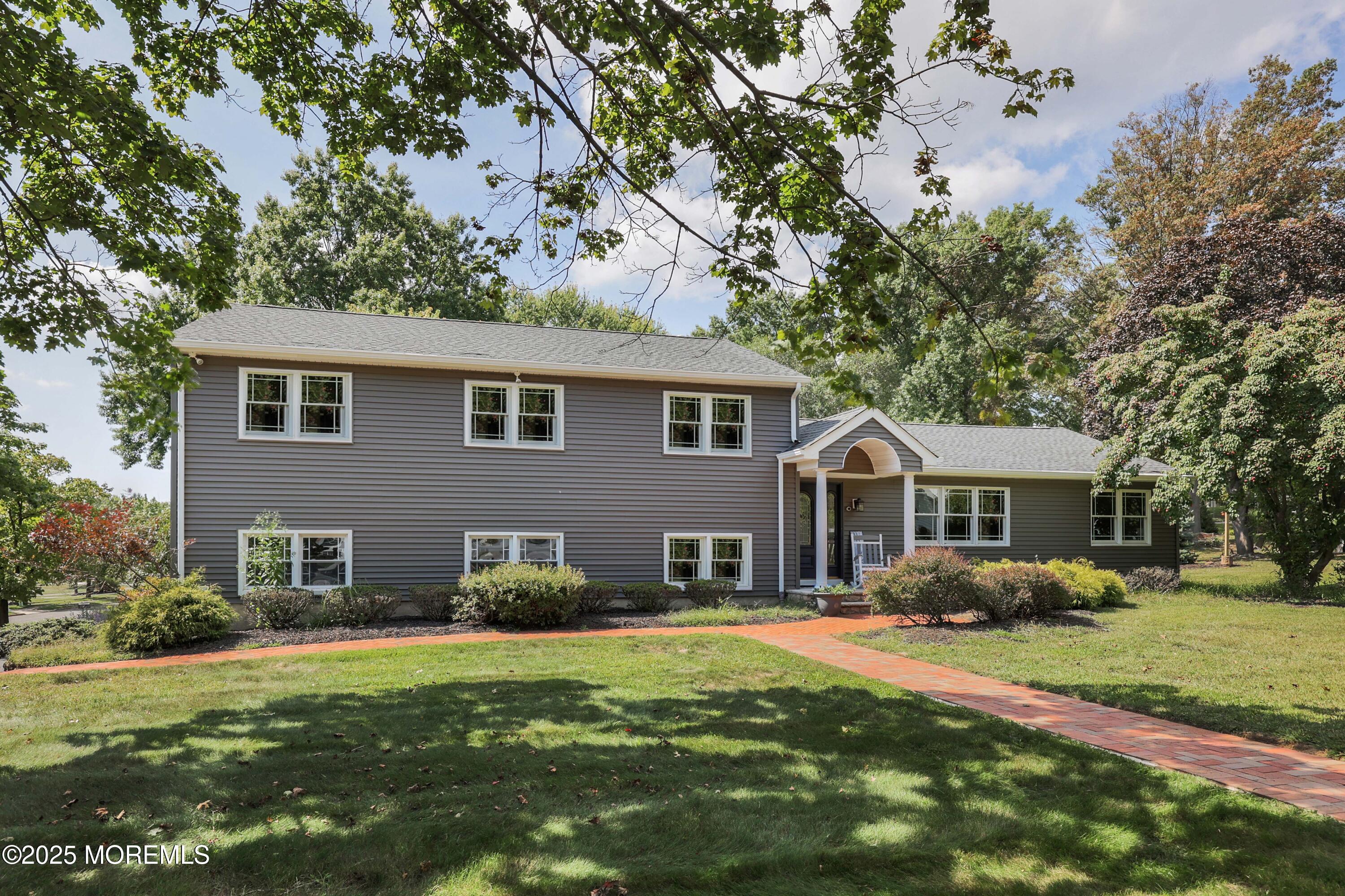 6 Hawthorne Road Red Bank, NJ 07701 - Photo 40 of 40 a front view of a house with a garden