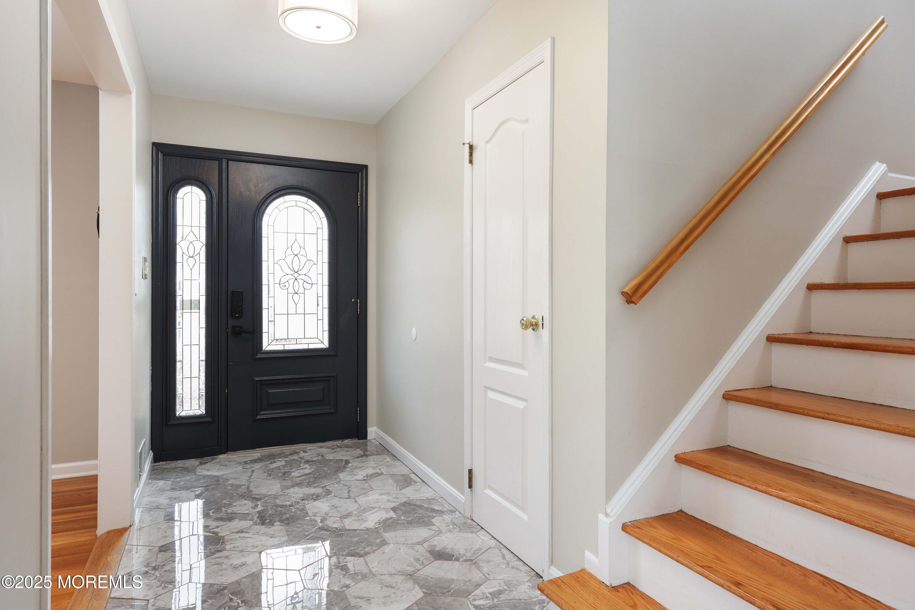 6 Hawthorne Road Red Bank, NJ 07701 - Photo 5 of 40 a view of a entryway door with wooden floor