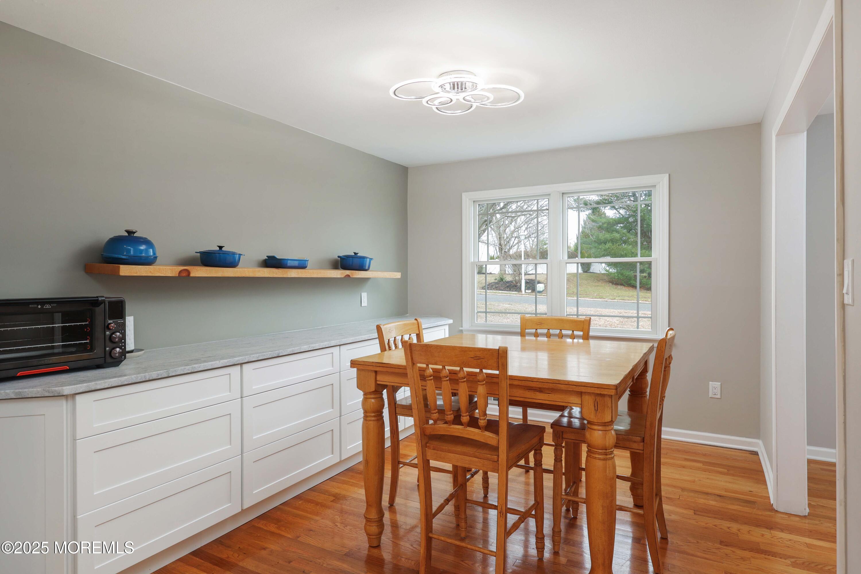 6 Hawthorne Road Red Bank, NJ 07701 - Photo 9 of 40 a view of a dining room with furniture and wooden floor