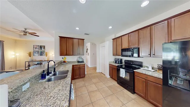 a large kitchen with cabinets