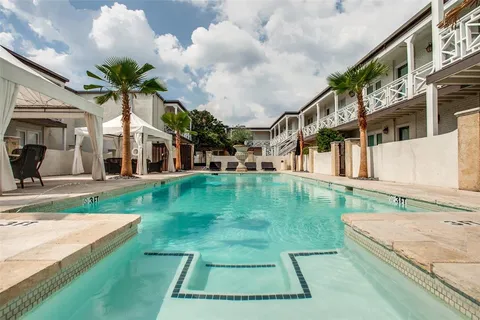 a view of a house with a swimming pool