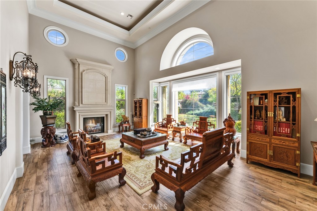 4117 Mt Baldy Road Claremont, CA 91711 - Photo 17 of 75 a living room with furniture fireplace and window