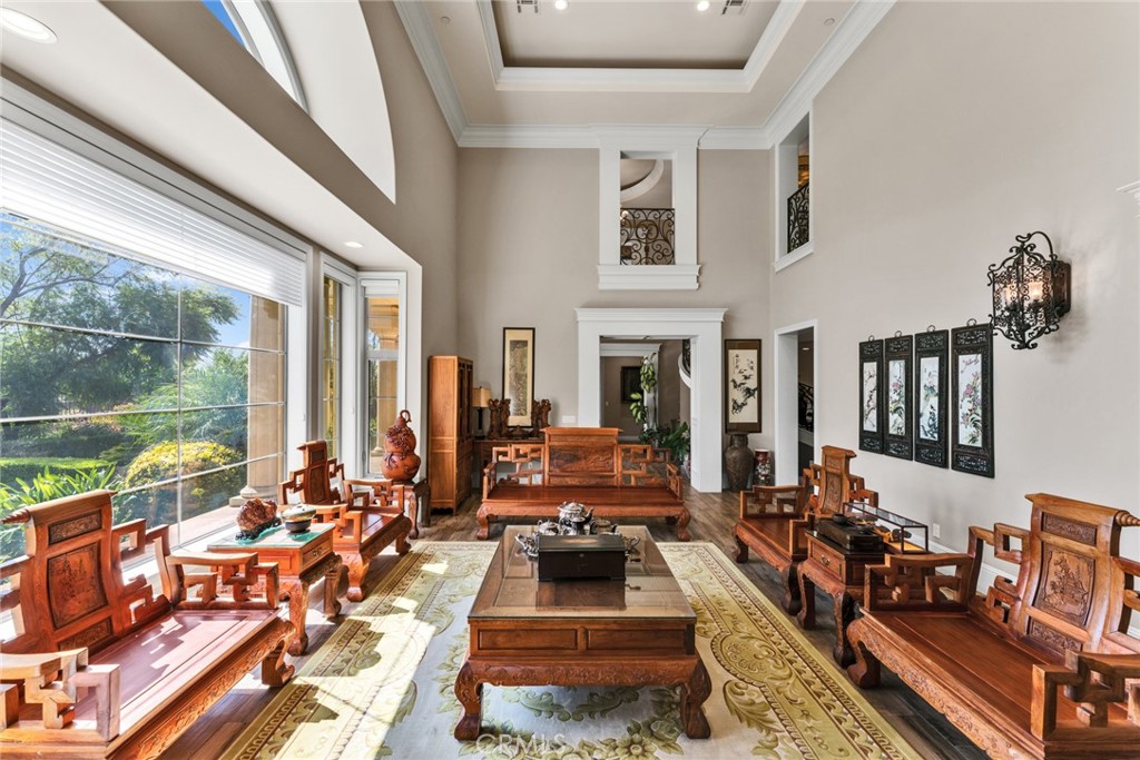 4117 Mt Baldy Road Claremont, CA 91711 - Photo 18 of 75 a living room with furniture and a floor to ceiling window