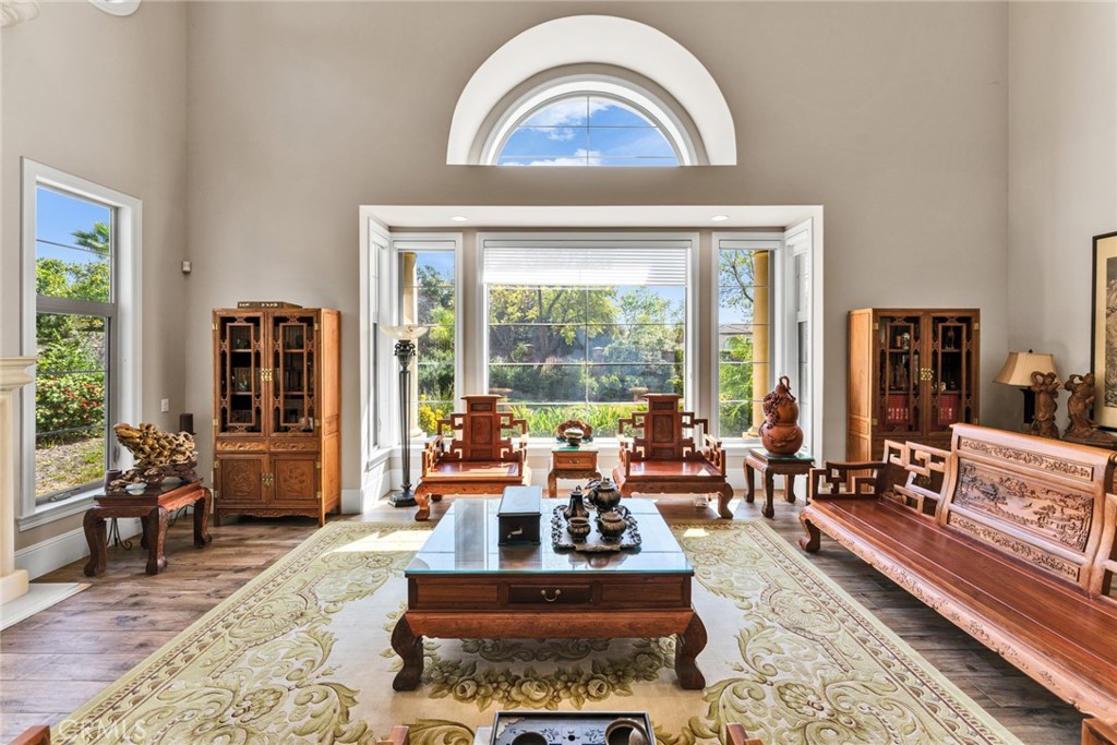 4117 Mt Baldy Road Claremont, CA 91711 - Photo 20 of 75 a living room with furniture and large windows