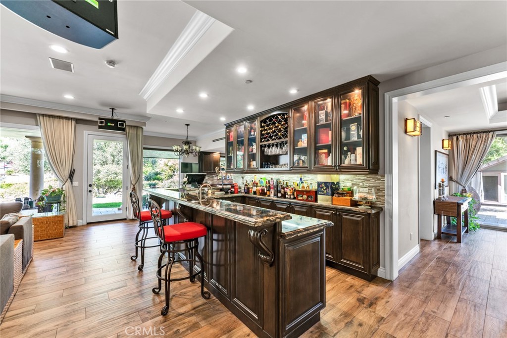 4117 Mt Baldy Road Claremont, CA 91711 - Photo 22 of 75 a kitchen with stainless steel appliances granite countertop a stove and cabinets