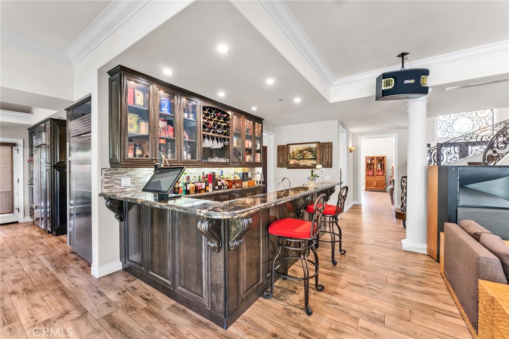 4117 Mt Baldy Road Claremont, CA 91711 - Photo 23 of 75 a kitchen with stainless steel appliances granite countertop a stove and cabinets