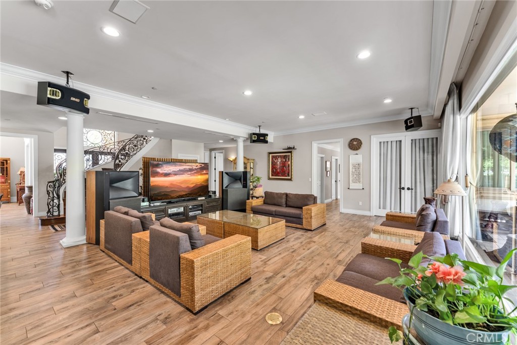 4117 Mt Baldy Road Claremont, CA 91711 - Photo 24 of 75 a living room with furniture and a flat screen tv