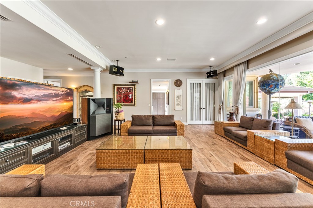 4117 Mt Baldy Road Claremont, CA 91711 - Photo 25 of 75 a living room with furniture and a flat screen tv