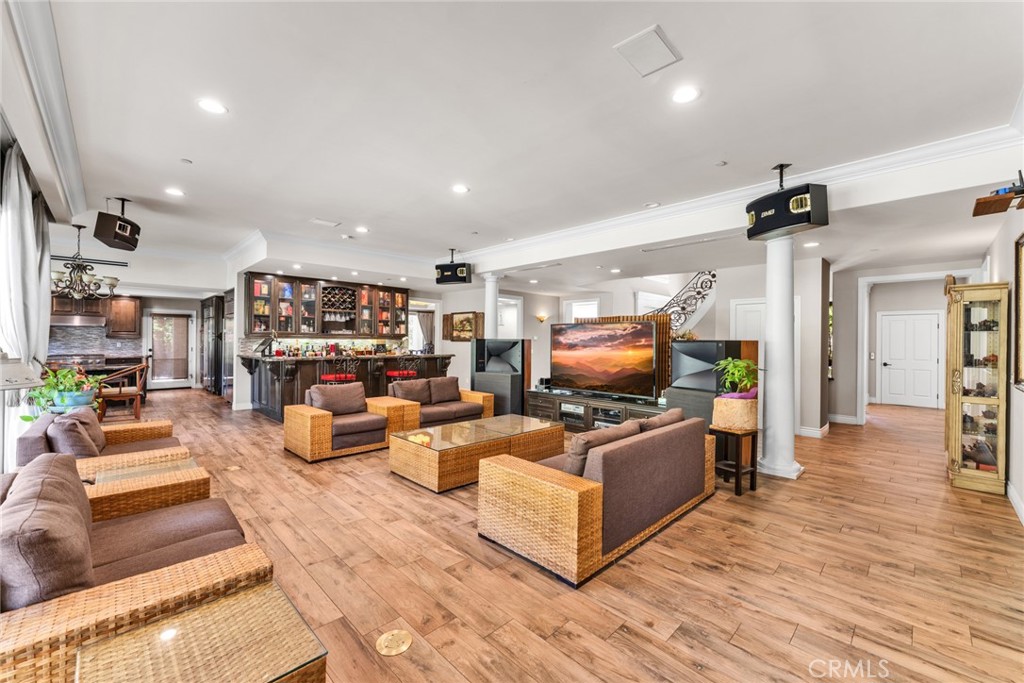 4117 Mt Baldy Road Claremont, CA 91711 - Photo 26 of 75 a living room with furniture and a flat screen tv