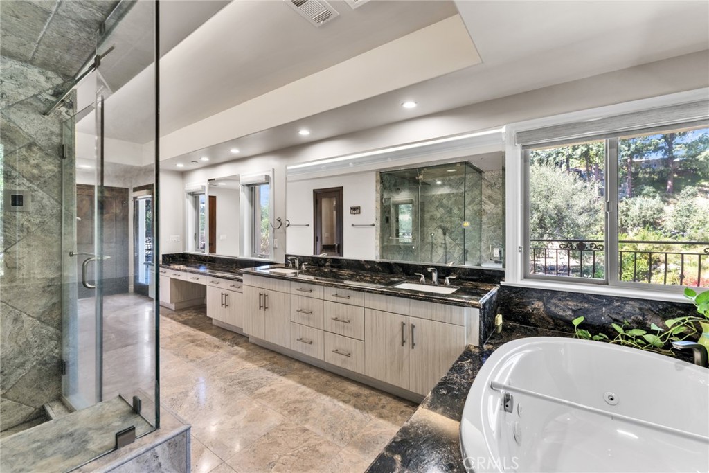 4117 Mt Baldy Road Claremont, CA 91711 - Photo 36 of 75 a large white kitchen with a large window