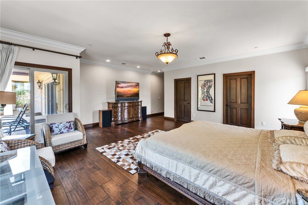 4117 Mt Baldy Road Claremont, CA 91711 - Photo 39 of 75 a spacious bedroom with a bed couch and a window