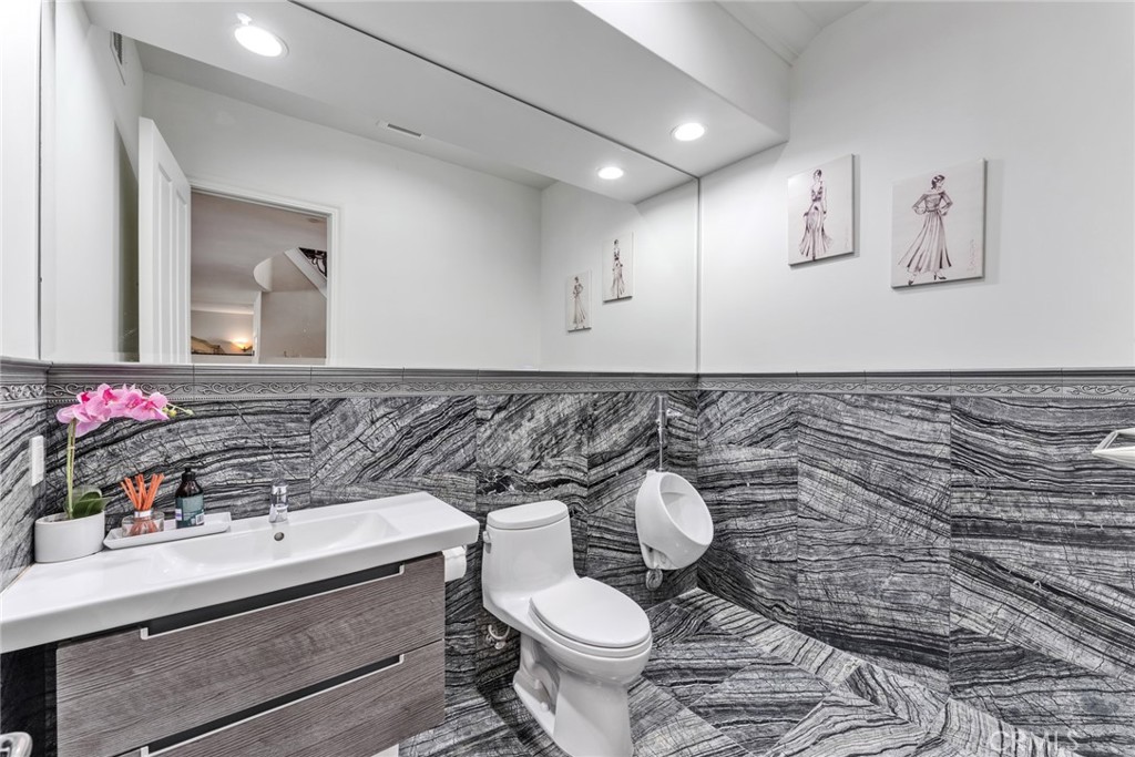 4117 Mt Baldy Road Claremont, CA 91711 - Photo 42 of 75 a bathroom with a sink and a toilet