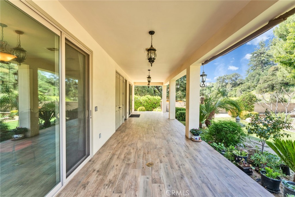 4117 Mt Baldy Road Claremont, CA 91711 - Photo 55 of 75 a view of a porch with wooden floor and outdoor space