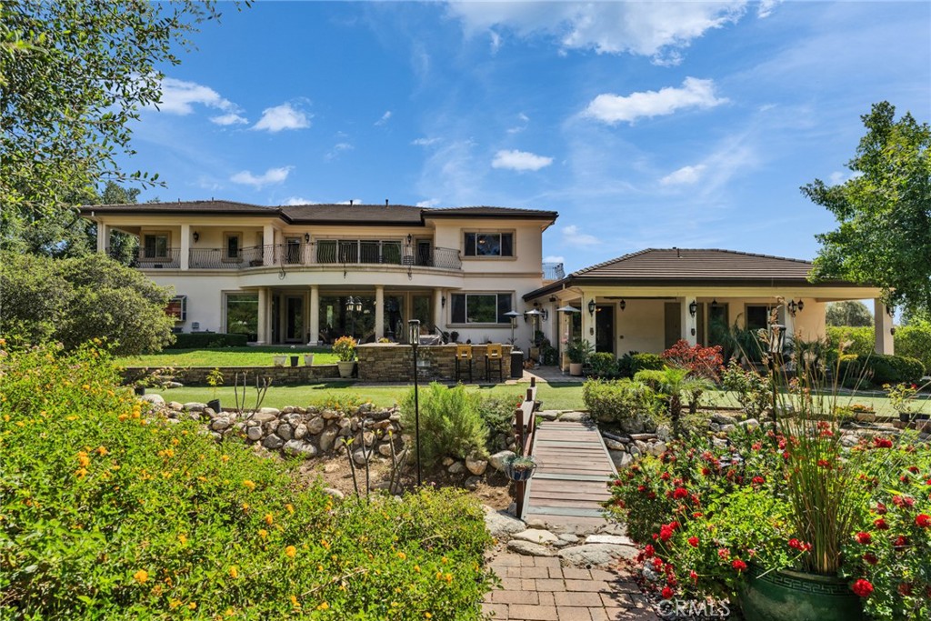 4117 Mt Baldy Road Claremont, CA 91711 - Photo 6 of 75 a front view of a house with a garden