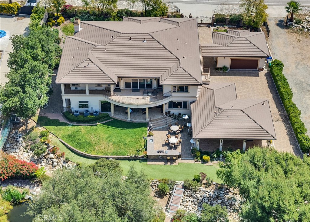 4117 Mt Baldy Road Claremont, CA 91711 - Photo 8 of 75 an aerial view of a house with swimming pool and a yard