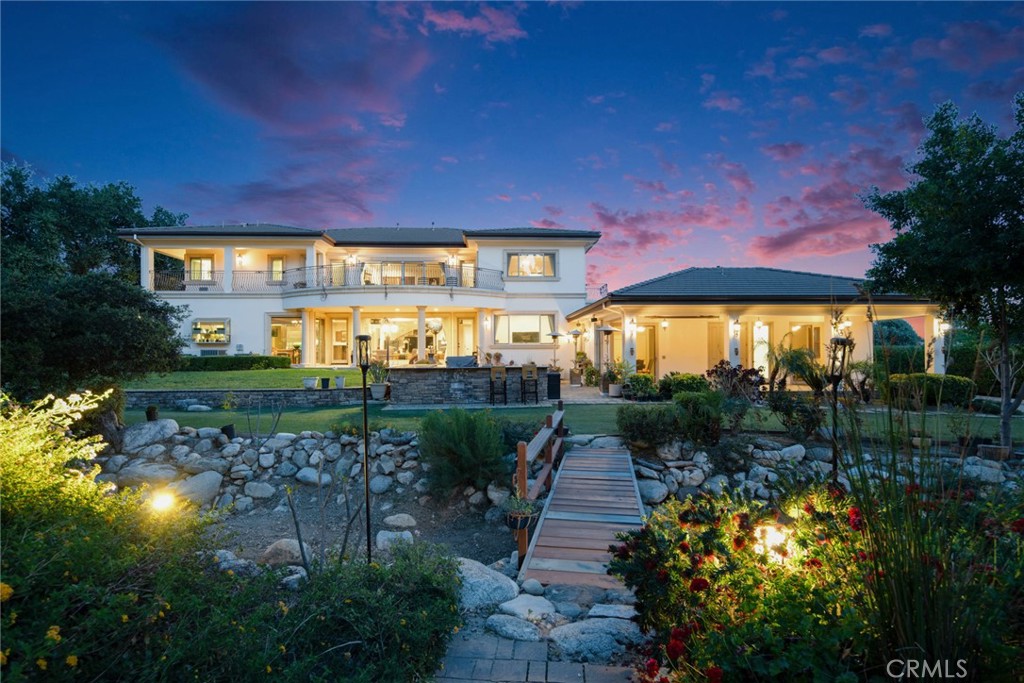 4117 Mt Baldy Road Claremont, CA 91711 - Photo 9 of 75 a view of a patio with table and chairs and potted plants