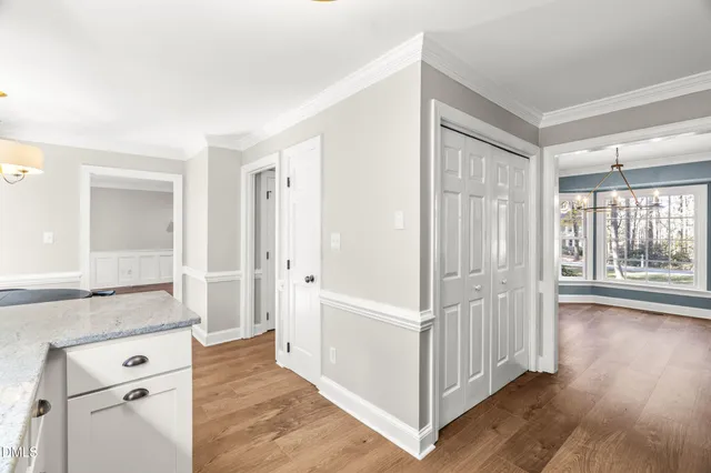 a kitchen with stainless steel appliances granite countertop a sink and a stove