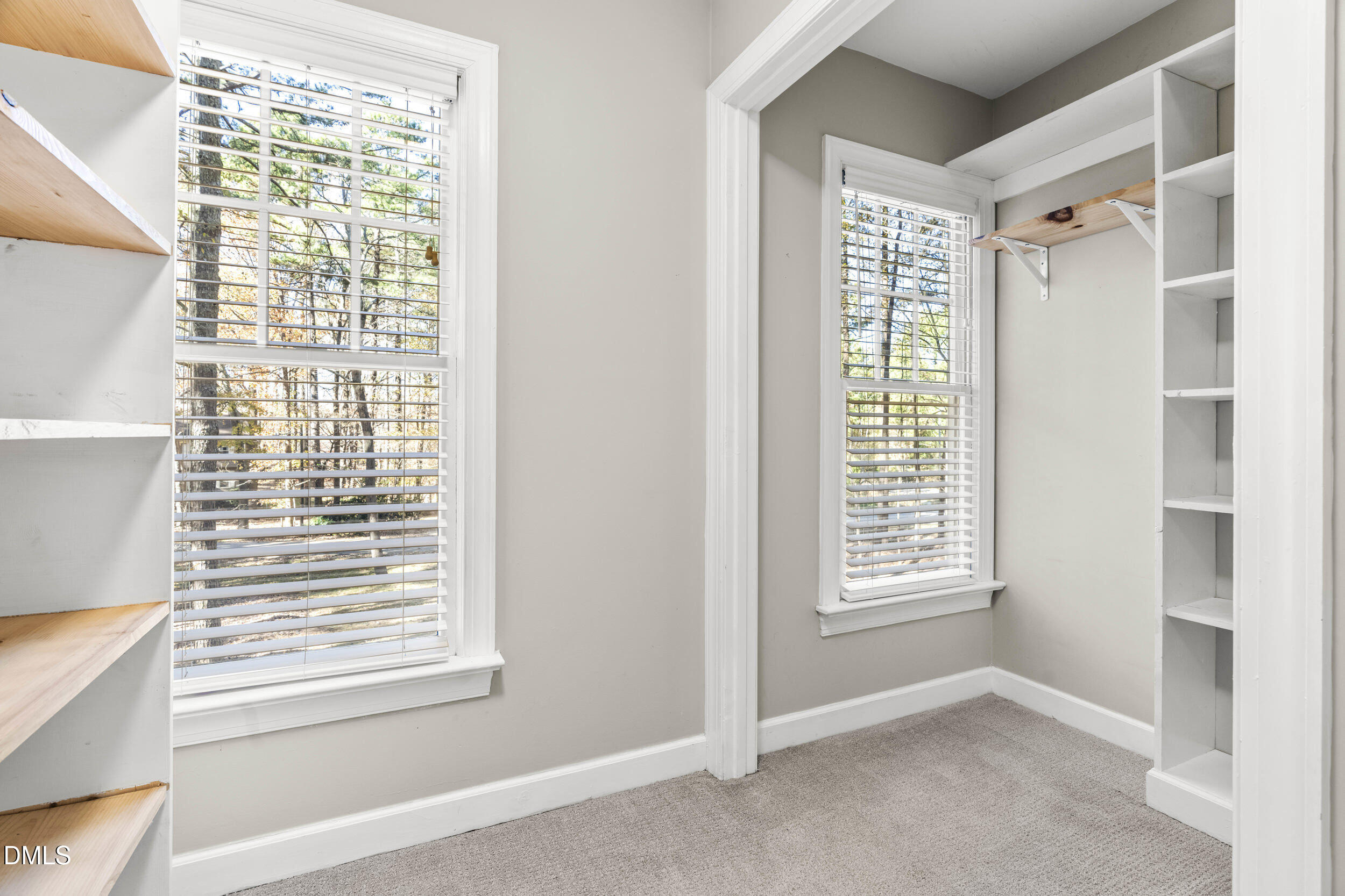 10716 Marthas Way Raleigh, NC 27615 - Photo 17 of 32 a view of an empty room with a window
