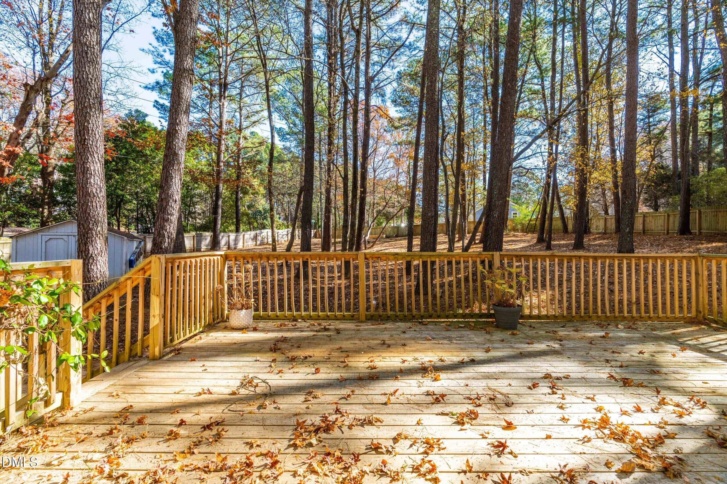 10716 Marthas Way Raleigh, NC 27615 - Photo 25 of 32 a view of a wooden fence