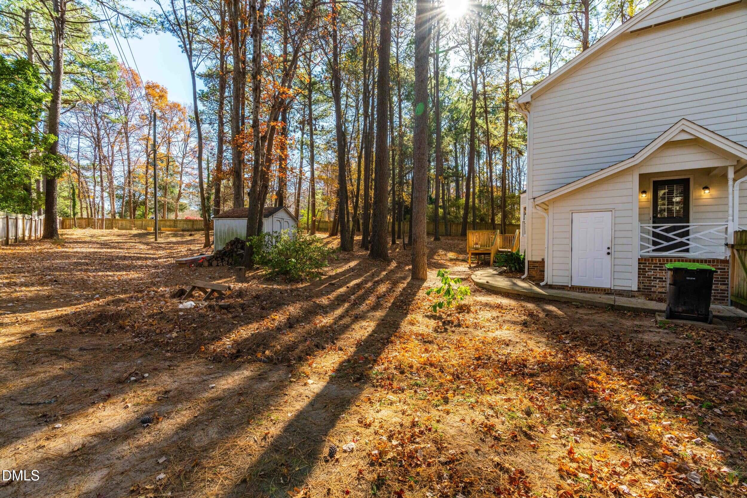 10716 Marthas Way Raleigh, NC 27615 - Photo 31 of 32 a view of a backyard of the house