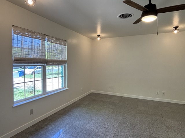 6303 Brookside Drive Austin, TX 78723 - Photo 16 of 26 an empty room with a window