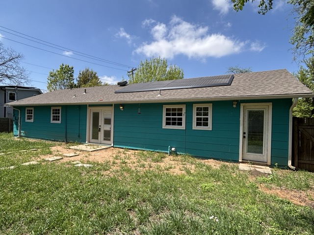 6303 Brookside Drive Austin, TX 78723 - Photo 7 of 26 a front view of a house with a garden