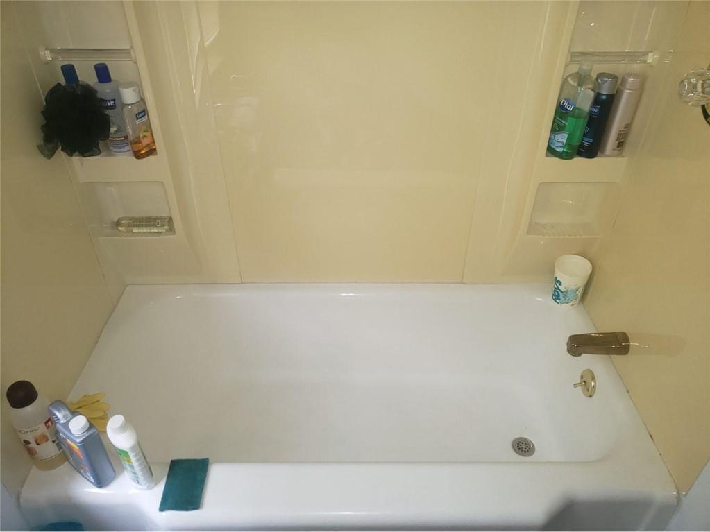 1054 Winfield Road Cabot, PA 16023 - Photo 14 of 22 a bathroom with a tub