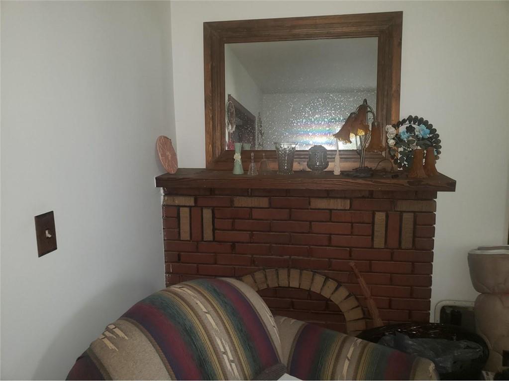 1054 Winfield Road Cabot, PA 16023 - Photo 4 of 22 a bedroom with a bed and a mirror
