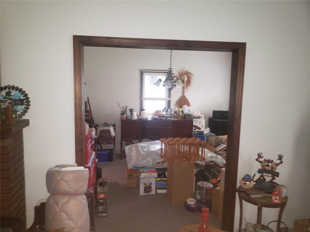 1054 Winfield Road Cabot, PA 16023 - Photo 6 of 22 view of a livingroom with furniture and a mirror