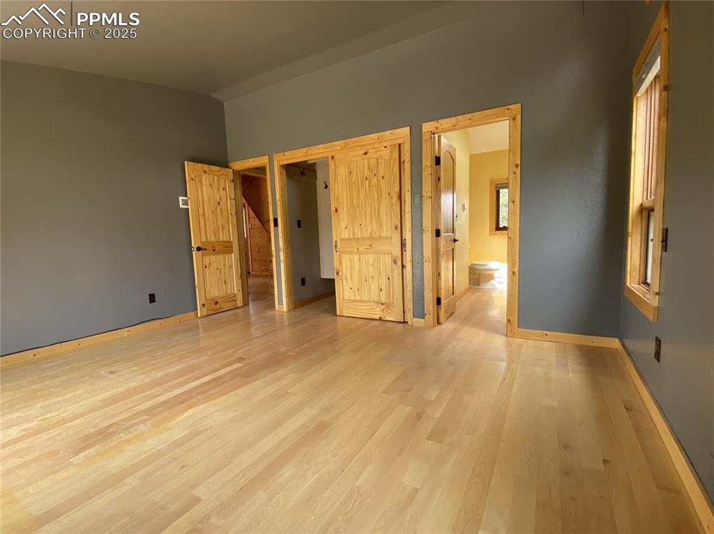 845 Markus Road Woodland Park, CO 80863 - Photo 10 of 40 a view of empty room with wooden floor and fan