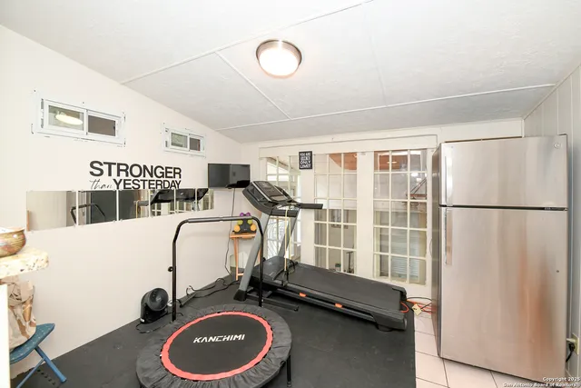 a view of a room with gym equipment