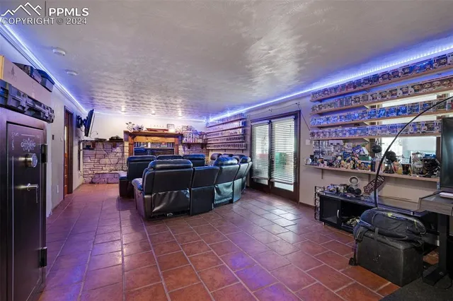 a room with lots of furniture and clutter